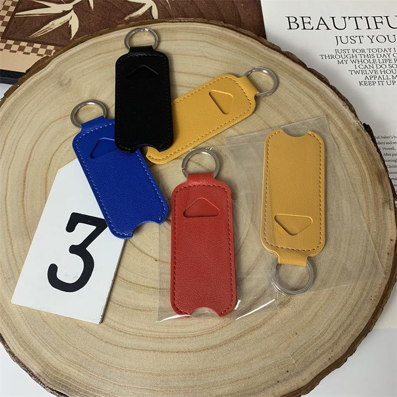 Draagbare lippenbalsem verpakk - Key Holder Leather Pouch recensie en prijs